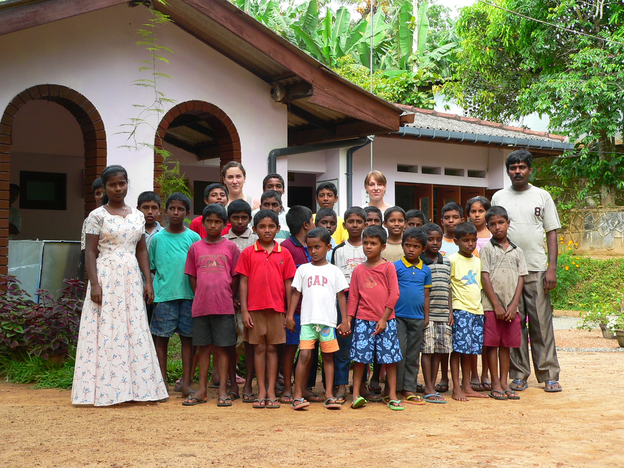 Volunteers with their class of students during a Teaching Add-on