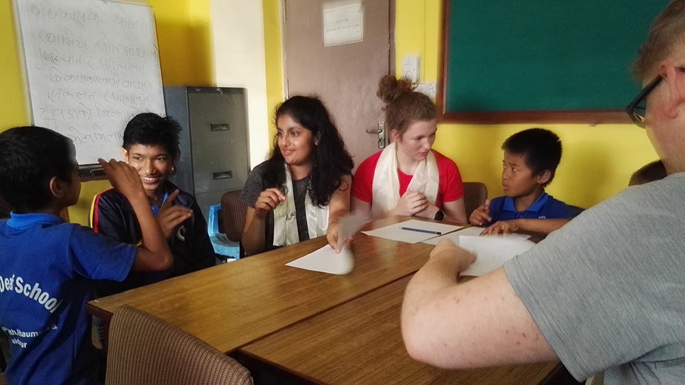 Vidhu teaching in a Deaf school in Kathmandu during her Nepal trip with VoluntEars