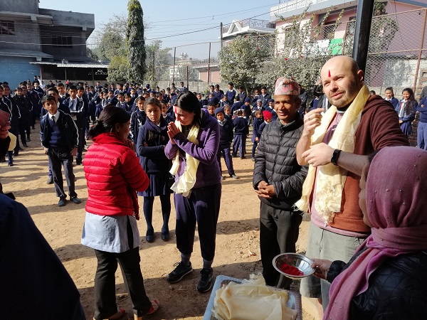Being welcomed to the Deaf school in Nepal. David the Communicator interpreting the local sign language