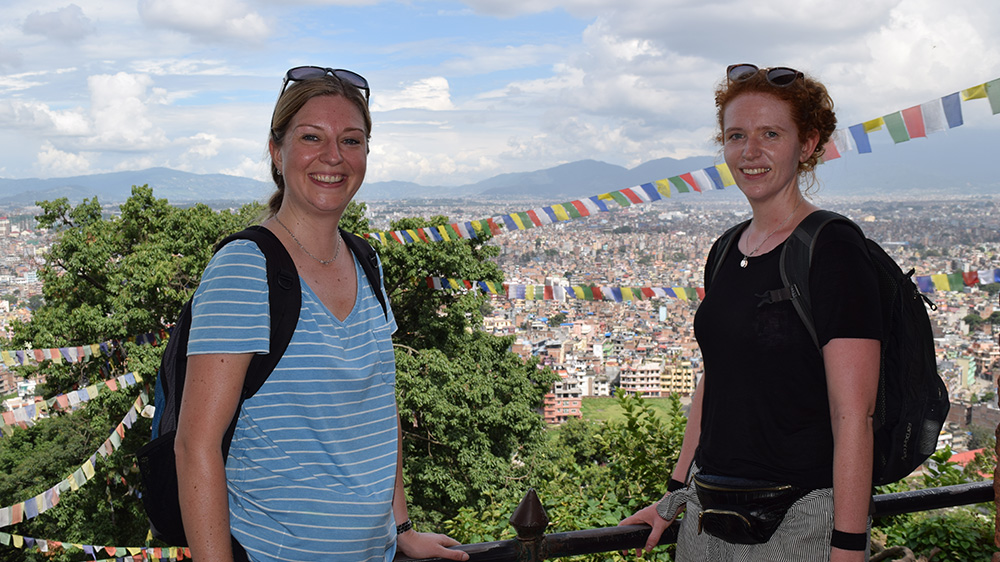 Kathryn (left) looking at the view of Kathmandu during her Nepal trip with VoluntEars