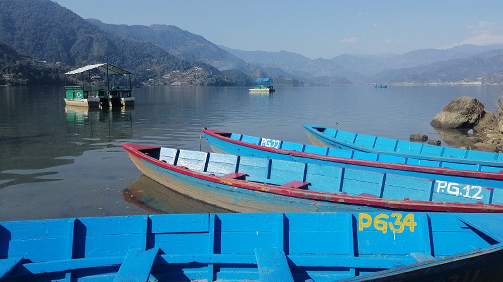 Bright coloured boats on Fewa Lake at Pokhara
