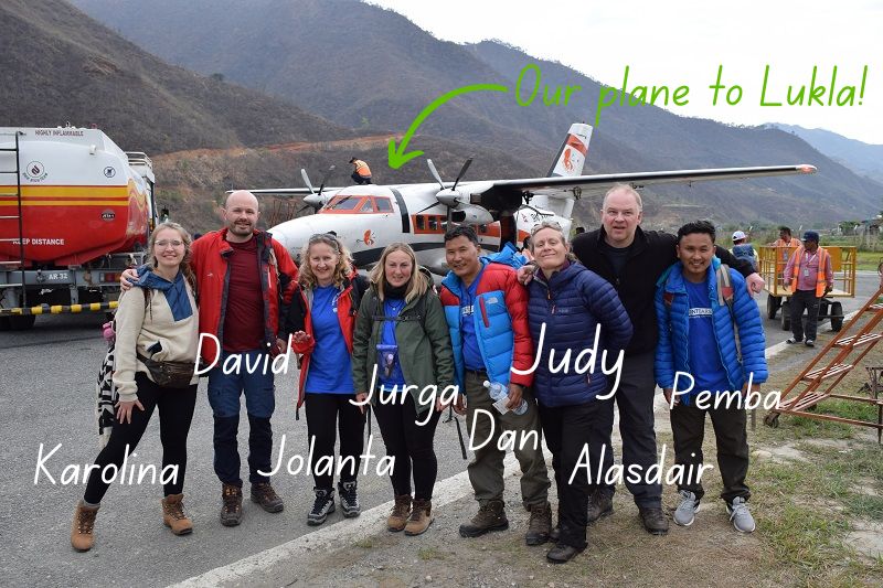 Judy with a group of volunteers and trekking guides waiting for the flight to Lukla