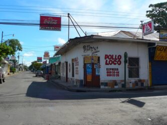 A local shop selling chicken on the corner in a small town in Costa Rica